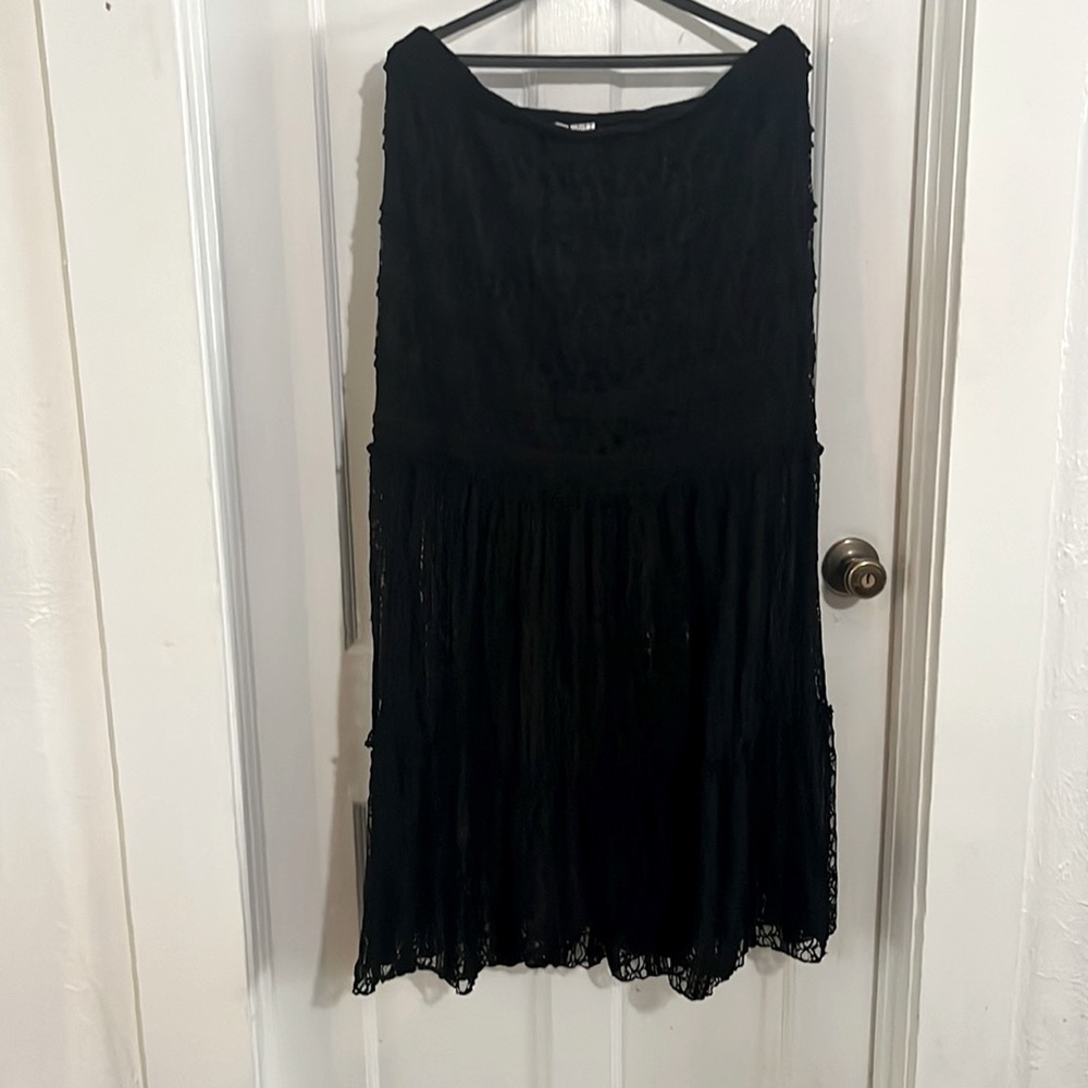 Long lace skirt with lining to knee.
